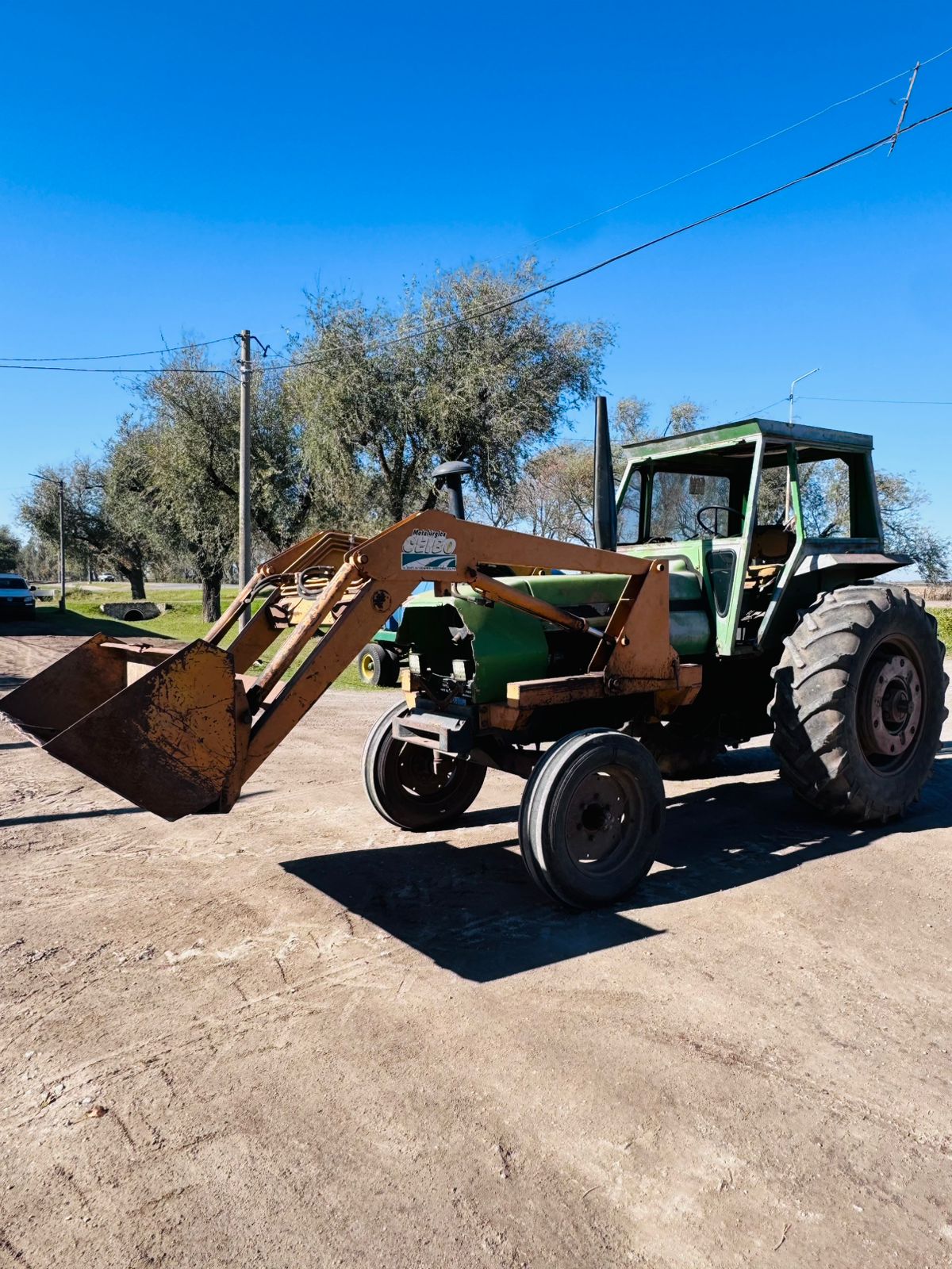 Tractor Deutz AX100 con pala Ceibo